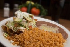 Beans dip Mexican rice and tortillas